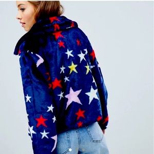 ASOS DESIGN navy blue faux fur jacket in colorful star print